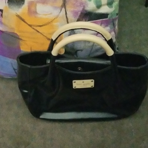 kate spade Handbags - kate spade Black Tote with Cream Handles and Logo Plaque! NEW!!
